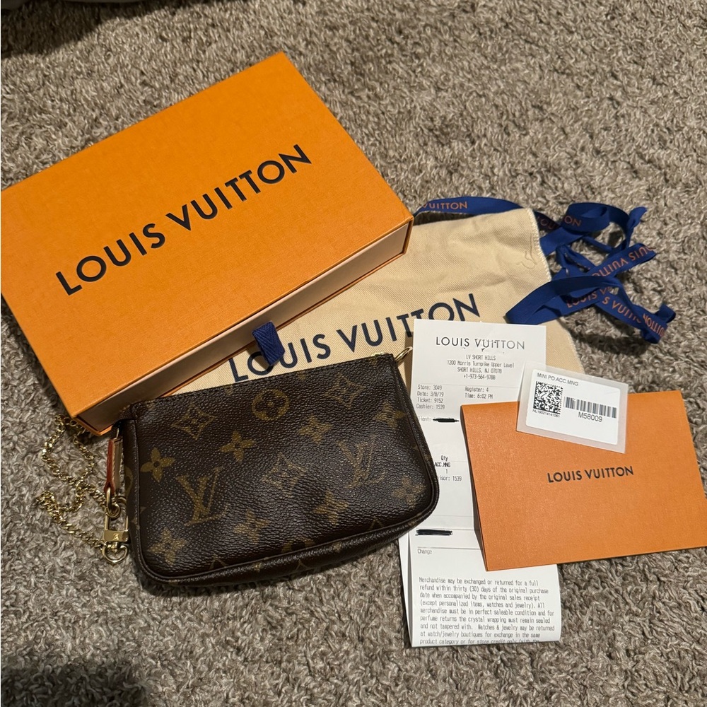 Authentic Louis Vuitton mini pochette accessories monogram